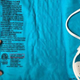 The back of a Mighty Bliss heating pad is shown. The lot number, in black text, is highlighted.